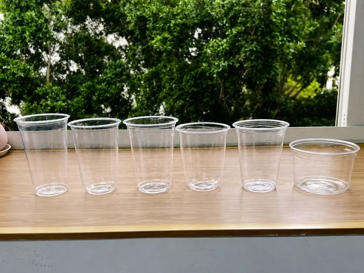 Clear PET cold-drink cups as an example of rigid #1 PET thermoform packaging